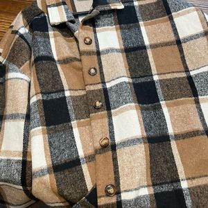 Women’s XL cute brown/tan/black fall flannel shocker. Never worn.
